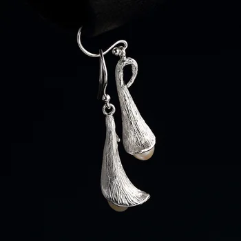 pure silver wire drawing restoring ancient ways with pearls wholesale high-grade temperament joker silver stud earrings
pure silver wire drawing restoring ancient ways with pearls wholesale high-grade temperament joker silver stud earrings