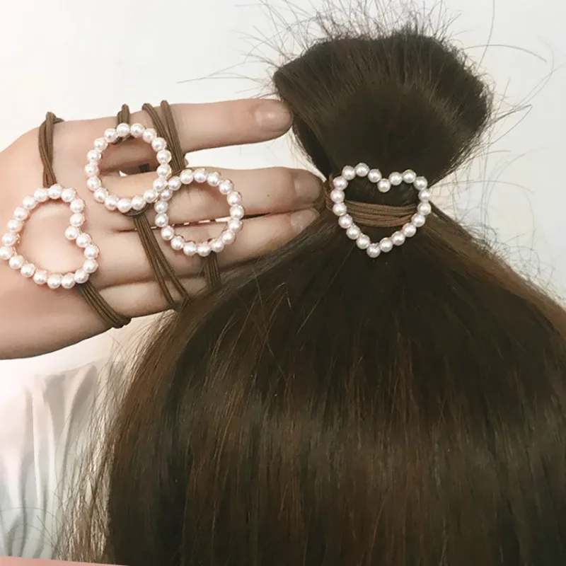 New hair rope female freshwater pearl love heart rope net red hair decoration simple tie hair band wholesale
New hair rope female freshwater pearl love heart rope net red hair decoration simple tie hair band wholesale