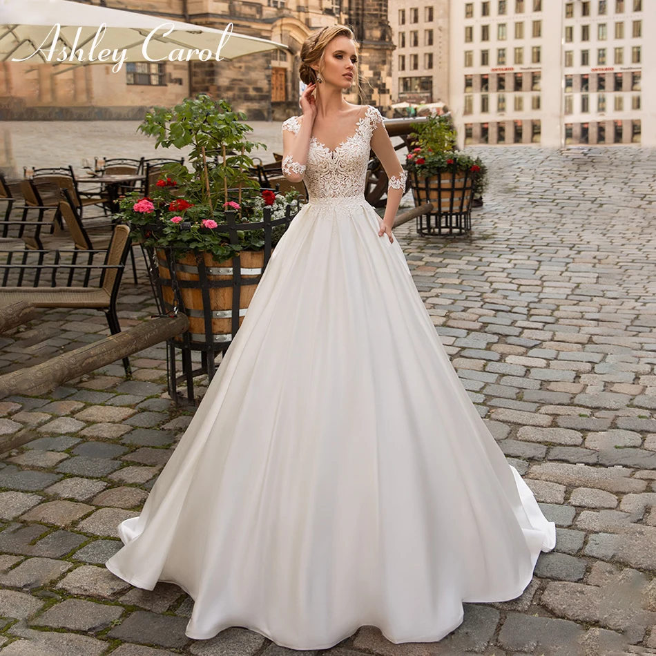 Ashley Carol Sexy V-neck Illusion Satin Vintage Lace Wedding Dress 2019 Half Sleeve Beaded Appliques Sweep Train Wedding Gowns
Ashley Carol Sexy V-neck Illusion Satin Vintage Lace Wedding Dress 2019 Half Sleeve Beaded Appliques Sweep Train Wedding Gowns