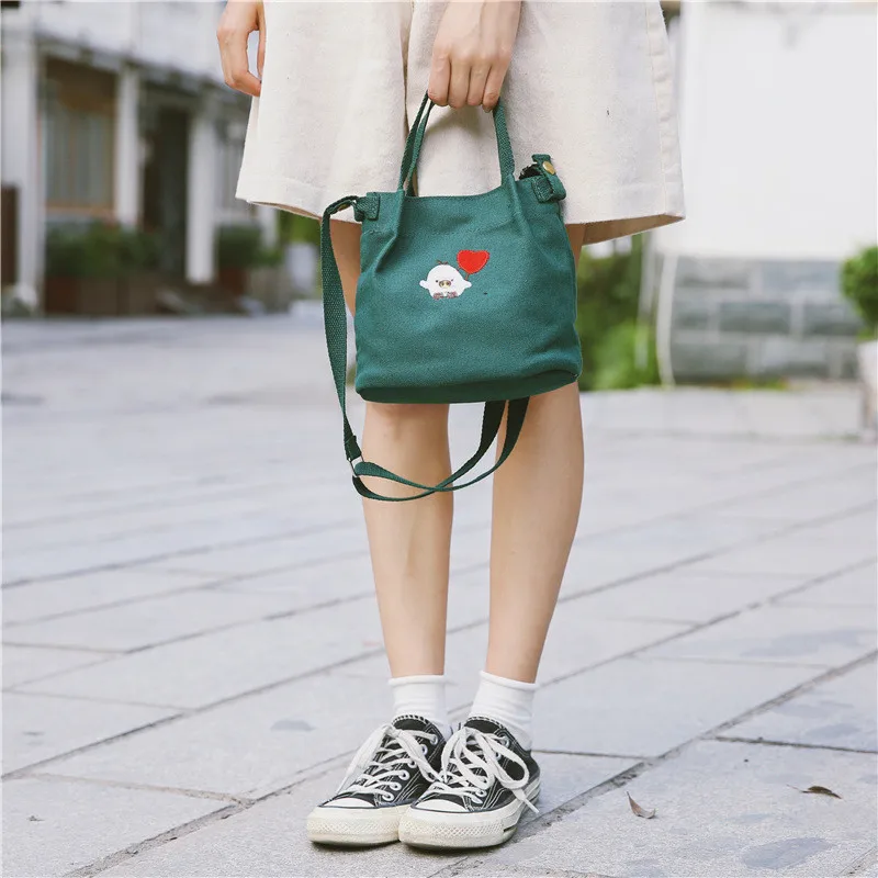 2018 Designer handbags high quality Women Bag Fresh Canvas Shoulder Bag New Heart embroidery Bucket Shoulder bag Feminina Bolsas
2018 Designer handbags high quality Women Bag Fresh Canvas Shoulder Bag New Heart embroidery Bucket Shoulder bag Feminina Bolsas
