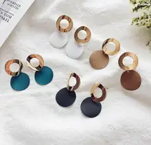 EK501 Venta caliente Simple hueco Metal redondo colgante pendientes para mujeres geométricos círculo cuelga pendientes joyería al por mayor Orecchini(China)