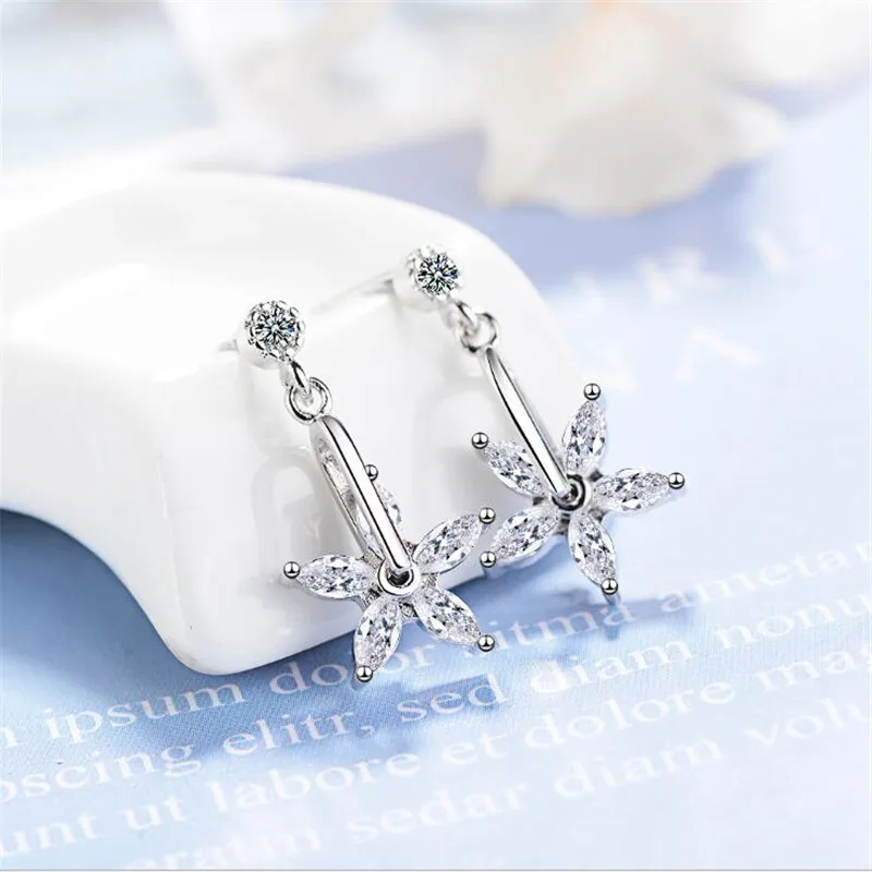 New Temperament Simple Flash Five-petal Flower 925 Sterling Silver Jewelry Fashion Exquisite Rotating Women Stud Earrings SE832 
New Temperament Simple Flash Five-petal Flower 925 Sterling Silver Jewelry Fashion Exquisite Rotating Women Stud Earrings SE832