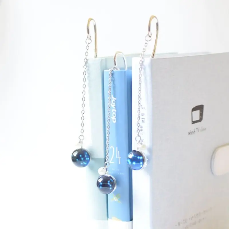 Creative Noctilucent 12 Constellation Bookmark Pendant Metal Book Marker Stationery School Office Supplies
Creative Noctilucent 12 Constellation Bookmark Pendant Metal Book Marker Stationery School Office Supplies