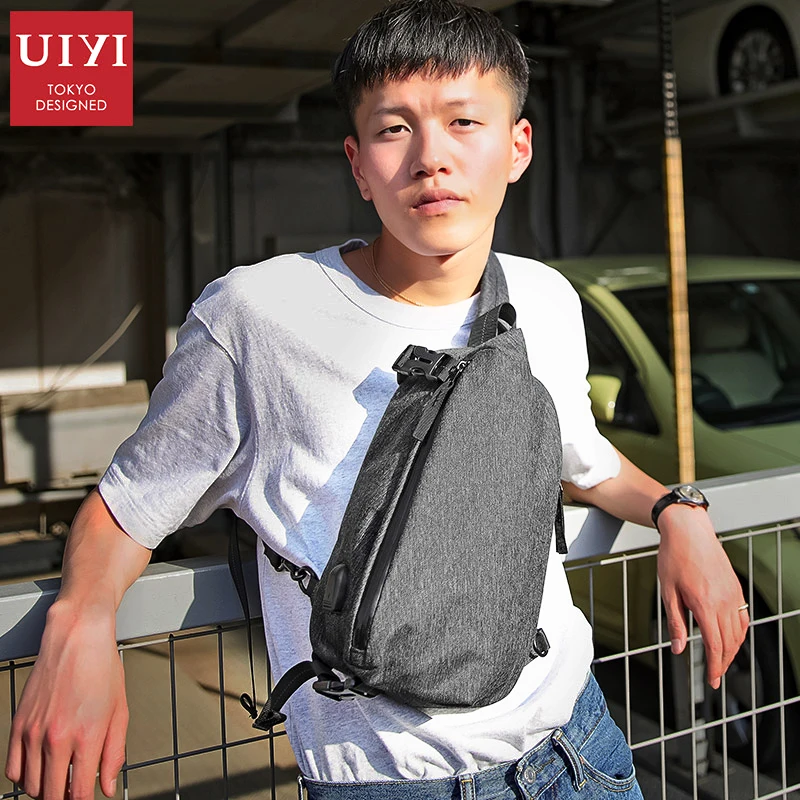 UIYI Men's USB External Charging Cable Fashion Chest Bag Waterproof Nylon Travel Shoulder Messenger Bag Male Handbag iPad Ba
UIYI Men's USB External Charging Cable Fashion Chest Bag Waterproof Nylon Travel Shoulder Messenger Bag Male Handbag iPad Ba