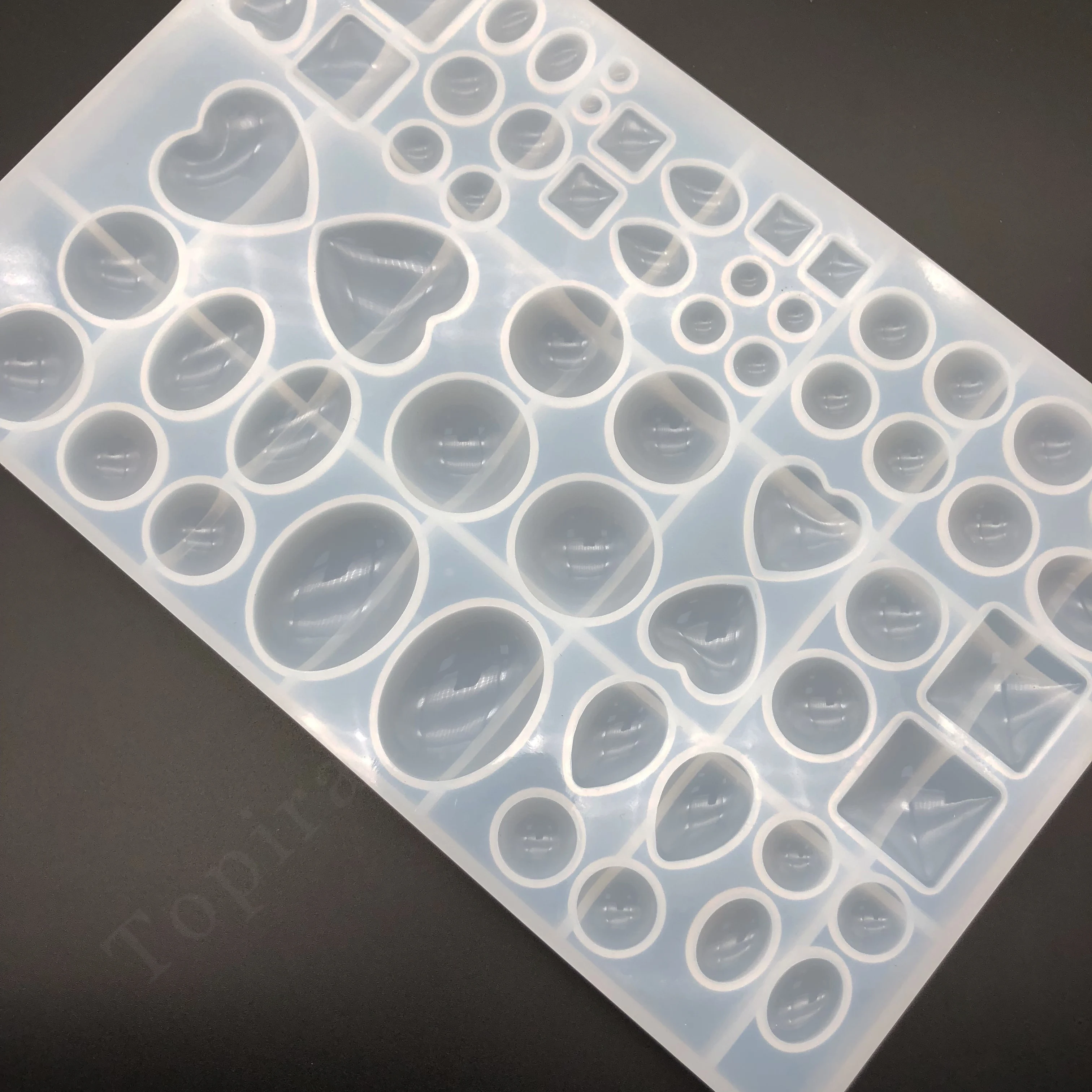 1pcs Heart Water Drop Round Beads Resin Molds DIY Silicone Pendant Mold Making Jewelry Pendant Resin Casting Mould Craft Tools
1pcs Heart Water Drop Round Beads Resin Molds DIY Silicone Pendant Mold Making Jewelry Pendant Resin Casting Mould Craft Tools