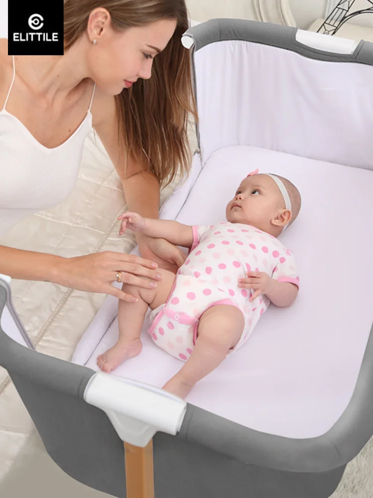 German Elm crib splicing large bed European Elm multi-function portable baby bed four wheel mobile with brake
German Elm crib splicing large bed European Elm multi-function portable baby bed four wheel mobile with brake