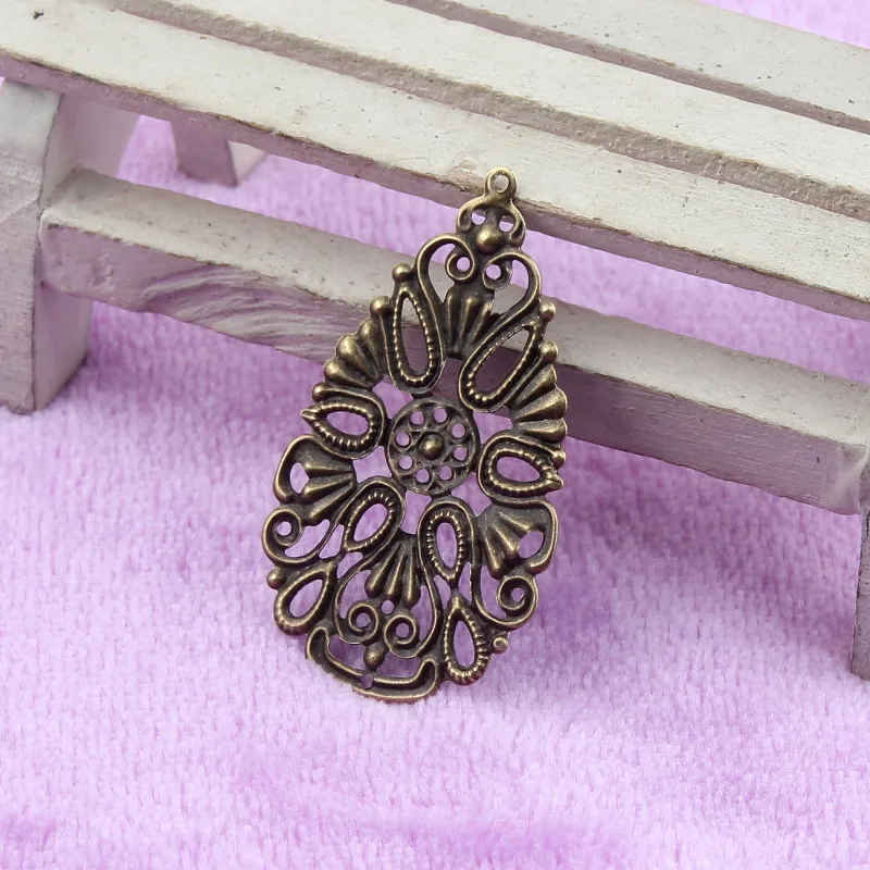 48X28mm 20Pcs Zinc Alloy Bronze Oval Filigree Wraps Flower Connectors for Jewelry Making DIY Accessories Charm Pendant
48X28mm 20Pcs Zinc Alloy Bronze Oval Filigree Wraps Flower Connectors for Jewelry Making DIY Accessories Charm Pendant
