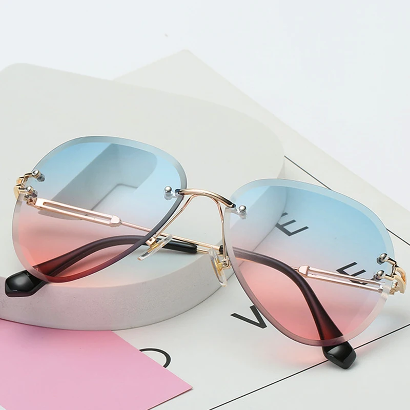 TOYEARN Gradient Shades Cutting Rimless Sunglasses Women High Quality Sexy Fashion Rimless Metal Sun Glasses UV400 Oculos De Sol
TOYEARN Gradient Shades Cutting Rimless Sunglasses Women High Quality Sexy Fashion Rimless Metal Sun Glasses UV400 Oculos De Sol