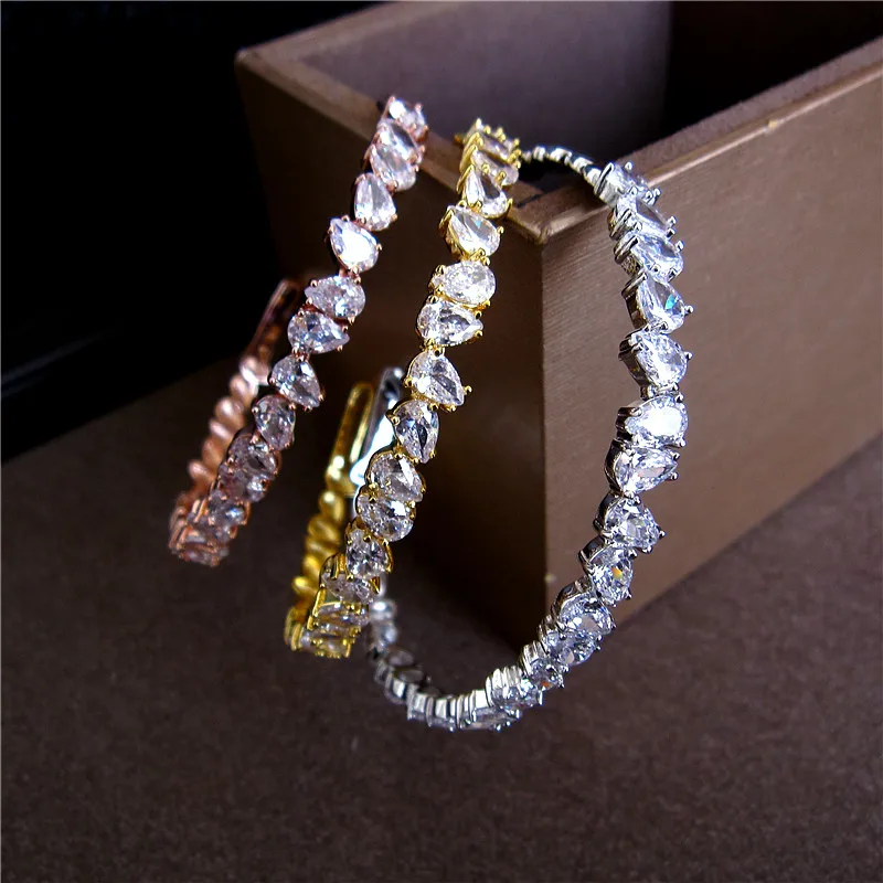 

Fashion AAA cubic zirconia teardrop stones bracelet thin shinning bangle cuff copper base womens accessaries.B0396