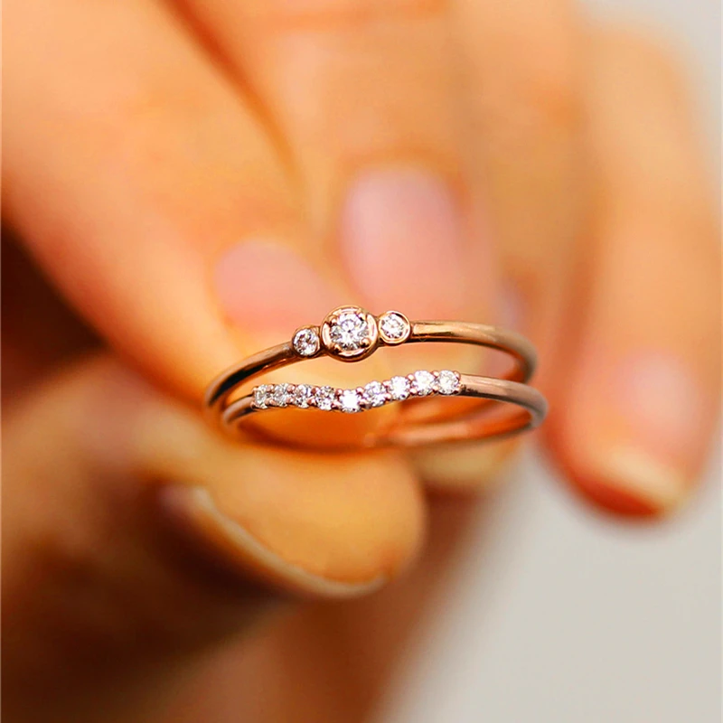 An exquisite set of single-row curved white zircon copper engagement rings for women's fashion finger accessory party rings
An exquisite set of single-row curved white zircon copper engagement rings for women's fashion finger accessory party rings
