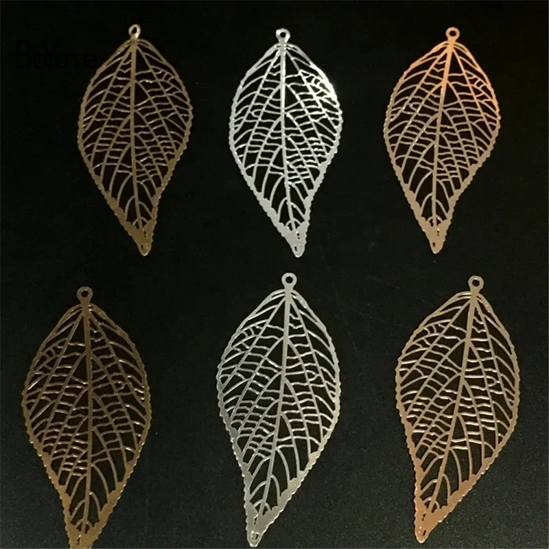 BoYuTe 40Pcs 43*20MM Filigree Leaf Metal Sheet Silver Gold Leaf Pendant Charms for Jewelry Making
BoYuTe 40Pcs 43*20MM Filigree Leaf Metal Sheet Silver Gold Leaf Pendant Charms for Jewelry Making