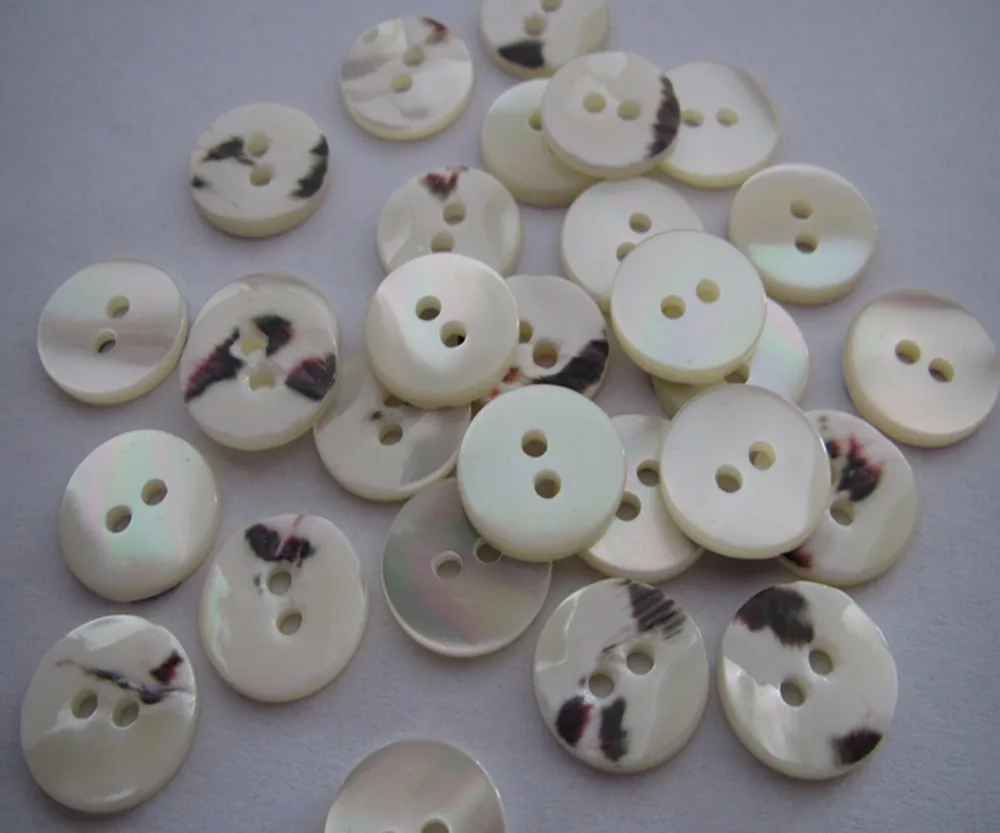 Free shipping 13mm two holes mother of pearl shell button flat trocas shell natural white color customed shell 100pcs
Free shipping 13mm two holes mother of pearl shell button flat trocas shell natural white color customed shell 100pcs