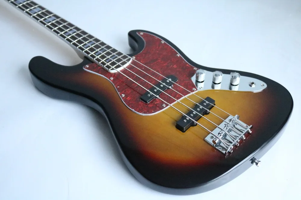Free delivery of electric bass guitar with rose finger and chrome hardware inlay, red PigGug, custom made
Free delivery of electric bass guitar with rose finger and chrome hardware inlay, red PigGug, custom made