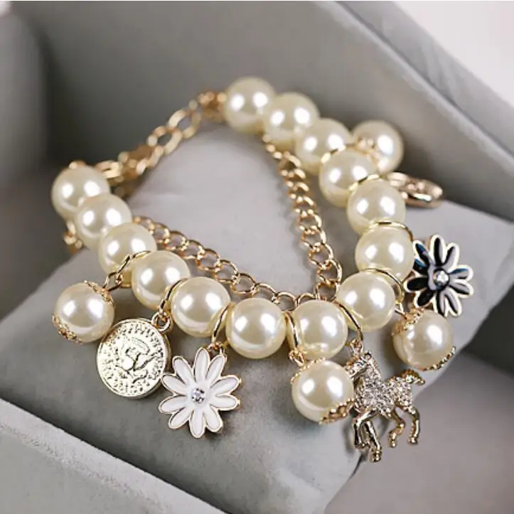 Korean Fashion Multilayer Gold Color Pearl Chain Bracelets & Bangles Horse Trojan Coins Petals Flowers Pendants Bracelets Women 
Korean Fashion Multilayer Gold Color Pearl Chain Bracelets & Bangles Horse Trojan Coins Petals Flowers Pendants Bracelets Women