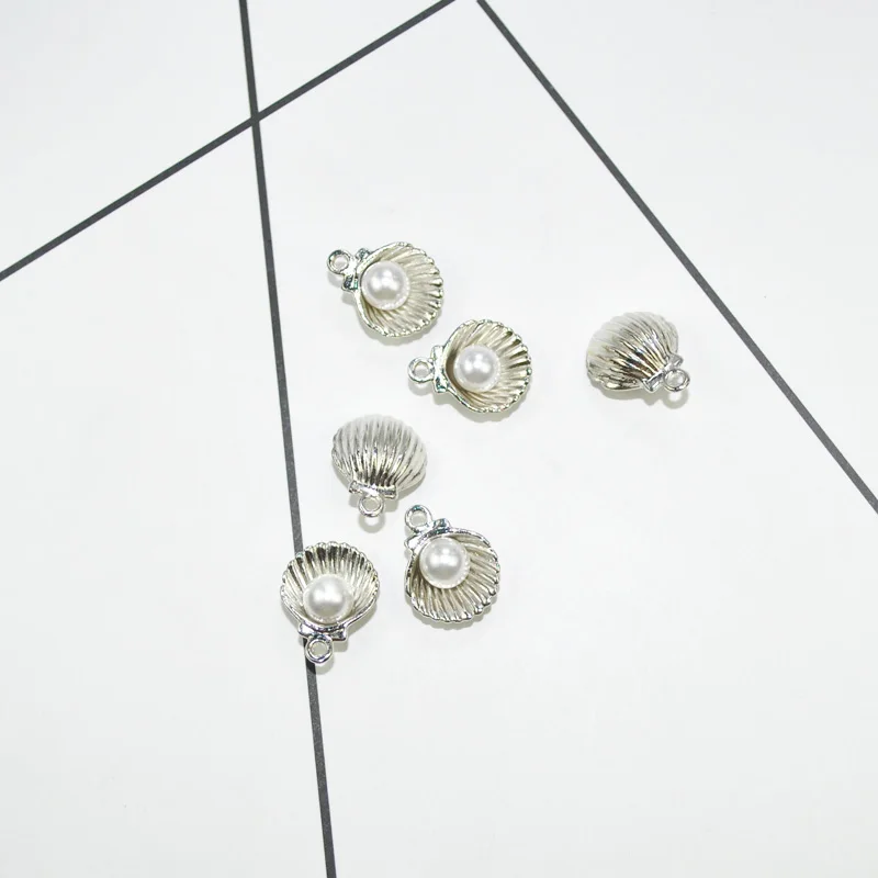 High quality 20pcs/lot 11.5*15mm Silver Color Imitation Pearl Shell Charms For Bracelet DIY Fashion Jewelry Accessories
High quality 20pcs/lot 11.5*15mm Silver Color Imitation Pearl Shell Charms For Bracelet DIY Fashion Jewelry Accessories