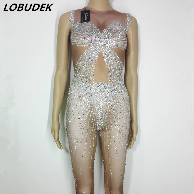 White Nude Rhinestones jumpsuit Costume sexy Crystals stretch elastic Jumpsuit female outfit Bar party Celebration show costumes
White Nude Rhinestones jumpsuit Costume sexy Crystals stretch elastic Jumpsuit female outfit Bar party Celebration show costumes