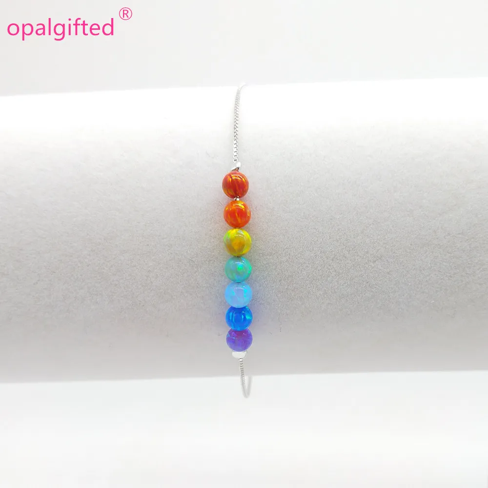 (1pc/lot)New Fashion Rainbow colors 4mm Opal Bead Bracelet With 925 Silver with 7 opal Round Balls Synthetic Opal Bracelets gift
(1pc/lot)New Fashion Rainbow colors 4mm Opal Bead Bracelet With 925 Silver with 7 opal Round Balls Synthetic Opal Bracelets gift
