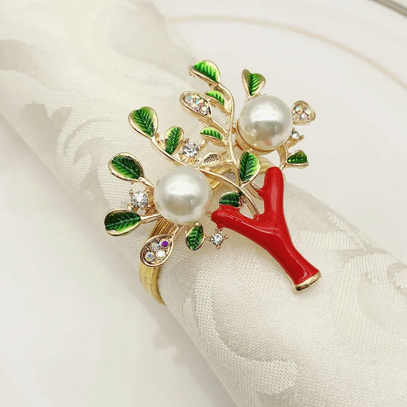 20PCS hotel supplies diamond Christmas tree napkin buckle pearl alloy napkin ring napkin ring mat towel ring
20PCS hotel supplies diamond Christmas tree napkin buckle pearl alloy napkin ring napkin ring mat towel ring