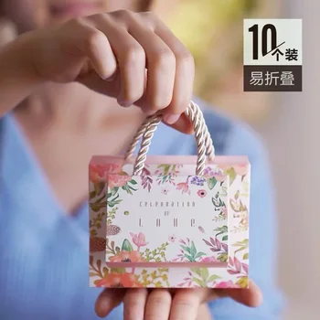 AVEBIEN 50pcs Romantic Clover Flower Candy Box Wedding Favors and Gifts Candy Boxs Pink Love Hand Bag Chocolate Paper Gift Box
AVEBIEN 50pcs Romantic Clover Flower Candy Box Wedding Favors and Gifts Candy Boxs Pink Love Hand Bag Chocolate Paper Gift Box
