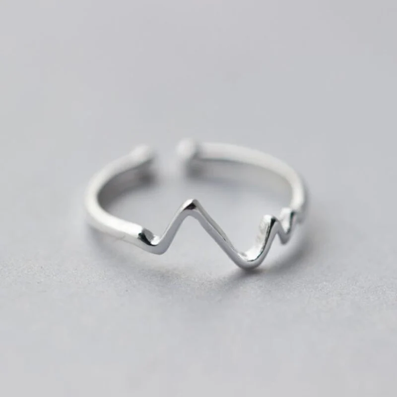 SMJEL New Trendy Wave Ring Adjustable Vintage ECG Heartbeat Rings for Women Wedding Jewelry Doctor Nurse Gift Bague femme
SMJEL New Trendy Wave Ring Adjustable Vintage ECG Heartbeat Rings for Women Wedding Jewelry Doctor Nurse Gift Bague femme