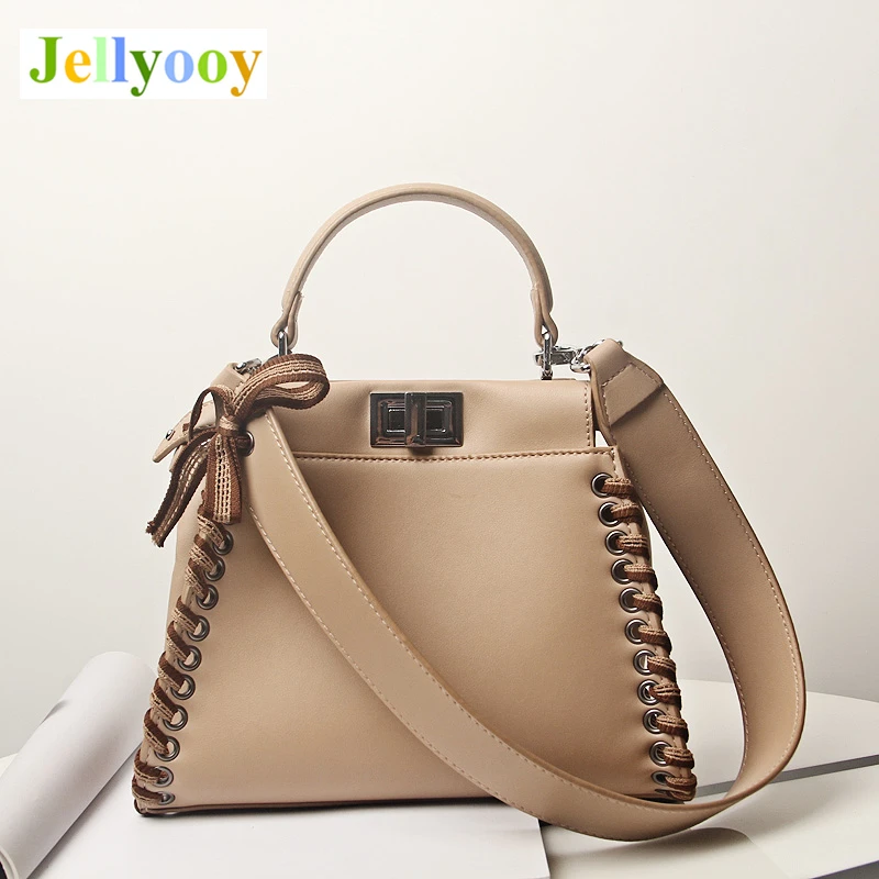 New Leather Peekaboo Bag 2018 Luxury Handbags Women Messenger Bags Designer High Quality Leg Bow Shoulder Bag Crossbody Tote Sac
New Leather Peekaboo Bag 2018 Luxury Handbags Women Messenger Bags Designer High Quality Leg Bow Shoulder Bag Crossbody Tote Sac