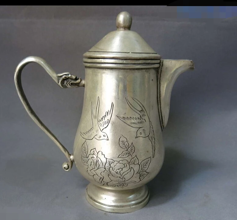 R0722 Details about 8" China silver feng shui lucky carved bird and peony Teapot sculpture Statue
R0722 Details about 8" China silver feng shui lucky carved bird and peony Teapot sculpture Statue