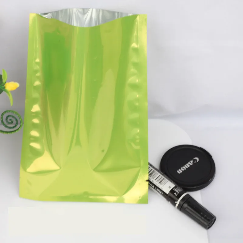 100pcs/lot 12x18cm Green aluminium foil bag - Aluminizing foil plastic pouch heat sealable food/tea storage package colored bags
100pcs/lot 12x18cm Green aluminium foil bag - Aluminizing foil plastic pouch heat sealable food/tea storage package colored bags