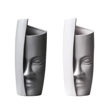Unique design abstract half face character ceramic vase Brief art Home office desktop decoration flower vase
Unique design abstract half face character ceramic vase Brief art Home office desktop decoration flower vase