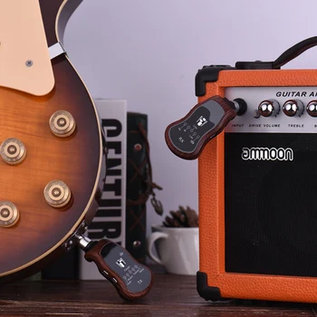 Portable UHF Guitar Wireless System Transmitter + Receiver 10 Channels Built-in 5 Effects (Clean/Bluesy/Flanger/Tremolo/Metal) for Electric Guitar Bass
Portable UHF Guitar Wireless System Transmitter + Receiver 10 Channels Built-in 5 Effects (Clean/Bluesy/Flanger/Tremolo/Metal) for Electric Guitar Bass