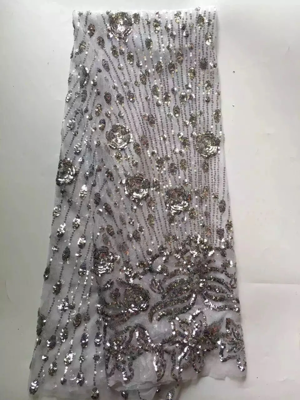 5 yards embroidered lace fabric with sequins beautiful Nigerian sequins lace fabric for party dress 
5 yards embroidered lace fabric with sequins beautiful Nigerian sequins lace fabric for party dress