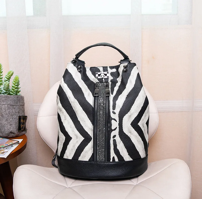new zebra female backpack bucket shoulder bag soft leather quality large women backpack travel teen fashion brand women backpack 
new zebra female backpack bucket shoulder bag soft leather quality large women backpack travel teen fashion brand women backpack