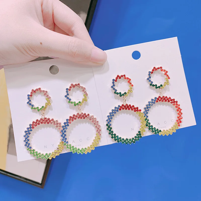 In the summer of 2019 the new south Korean holiday atmosphere quality color color full drill geometry circular earrings
In the summer of 2019 the new south Korean holiday atmosphere quality color color full drill geometry circular earrings