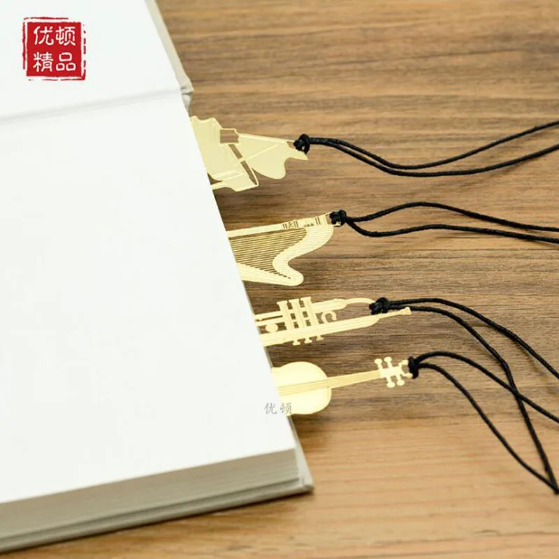 Novelty Exquisite Musical Instrument Metal Mini Bookmarks Six Books Metal Creative Simple Bookmarks Literary Music Bookmarks
Novelty Exquisite Musical Instrument Metal Mini Bookmarks Six Books Metal Creative Simple Bookmarks Literary Music Bookmarks