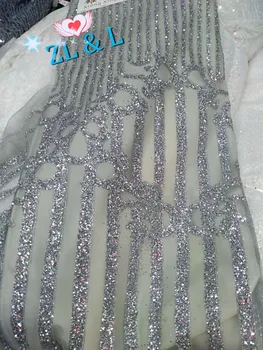 ZLL-2912 Glitter Champagne Sequins Glued French Mesh African Lace Fabric Nigerian Lace Suitable for Wedding Dresses
ZLL-2912 Glitter Champagne Sequins Glued French Mesh African Lace Fabric Nigerian Lace Suitable for Wedding Dresses