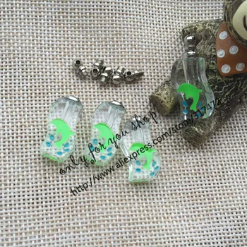 Luminous dolphins Glass Vial Pendants /CHARM Jewelry Pendant/ Glass Essential Oil pendant Glow in Dark
Luminous dolphins Glass Vial Pendants /CHARM Jewelry Pendant/ Glass Essential Oil pendant Glow in Dark