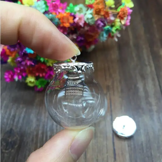 100sets 25*15mm Glass globe silver color crown base glass vials pendant jewelry DIY glass bottle pendant glass dome cover charms
100sets 25*15mm Glass globe silver color crown base glass vials pendant jewelry DIY glass bottle pendant glass dome cover charms