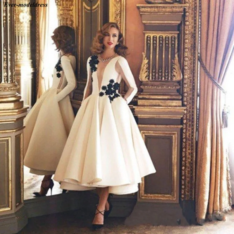 Vintage White With Black Appliques Tea Length Evening Dresses Long Sheer Sleeves Arabic abiye gece elbisesi 2019
Vintage White With Black Appliques Tea Length Evening Dresses Long Sheer Sleeves Arabic abiye gece elbisesi 2019