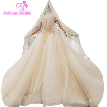 2018 Luxury Champagne Lace Bead Sleeveless Sweetheart Cathedral Bridal Gowns Train Floor-length Wedding Dresses With Long Veil
2018 Luxury Champagne Lace Bead Sleeveless Sweetheart Cathedral Bridal Gowns Train Floor-length Wedding Dresses With Long Veil