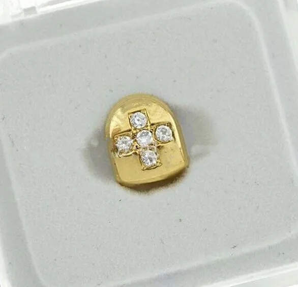 Hip Hop Gold Cross Single Teeth Rhinestone Bling Grills Top Dental Mouth Punk Fake Tooth Caps Cosplay Party Rock Rapper Body Jew
Hip Hop Gold Cross Single Teeth Rhinestone Bling Grills Top Dental Mouth Punk Fake Tooth Caps Cosplay Party Rock Rapper Body Jew