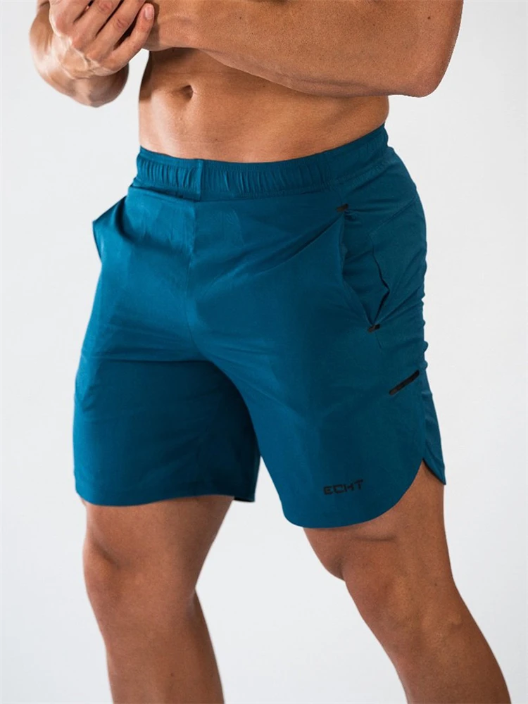 YEMEKE Mens Breathable Shorts Fitness Bodybuilding Fashion Casual Gyms male Joggers Workout Brand Beach Slim short Pants
YEMEKE Mens Breathable Shorts Fitness Bodybuilding Fashion Casual Gyms male Joggers Workout Brand Beach Slim short Pants
