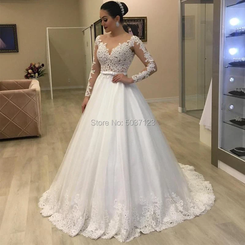 Vestidos De Noiva A Line Wedding Dresses Sweetheart Lace Appliques Beading Long Sleeves Open Back Marriage Bridal Gown for Bride
Vestidos De Noiva A Line Wedding Dresses Sweetheart Lace Appliques Beading Long Sleeves Open Back Marriage Bridal Gown for Bride