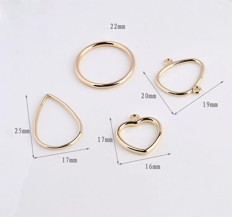 50pcs/lot alloy gold color geometry rounds/hearts/Water drop shape floating locket charms diy jewelry earring/bracelet pendants
50pcs/lot alloy gold color geometry rounds/hearts/Water drop shape floating locket charms diy jewelry earring/bracelet pendants