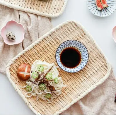 Soba noodles with cold noodles and bamboo baskets Handmade bamboo woven storage baskets with snacks and dried fruit platters
Soba noodles with cold noodles and bamboo baskets Handmade bamboo woven storage baskets with snacks and dried fruit platters