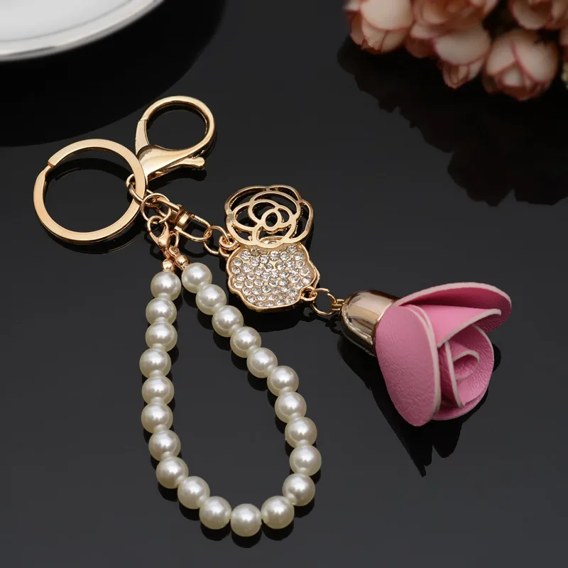 Charm Pink Mountain tea flower Keychain Gold Color Crystal Bow Chain Tassel Key Ring Porte Clef Bag Pendant Jewelry hot sale
Charm Pink Mountain tea flower Keychain Gold Color Crystal Bow Chain Tassel Key Ring Porte Clef Bag Pendant Jewelry hot sale