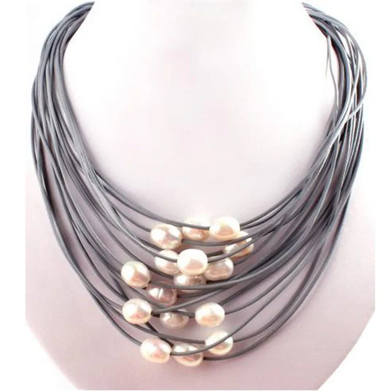 New Women's Fashion 10-12mm Natural Oval White Freshwater Pearl Stone Handwork 15 Row Leather Fashion Necklace 16"-22" AAA942
New Women's Fashion 10-12mm Natural Oval White Freshwater Pearl Stone Handwork 15 Row Leather Fashion Necklace 16"-22" AAA942