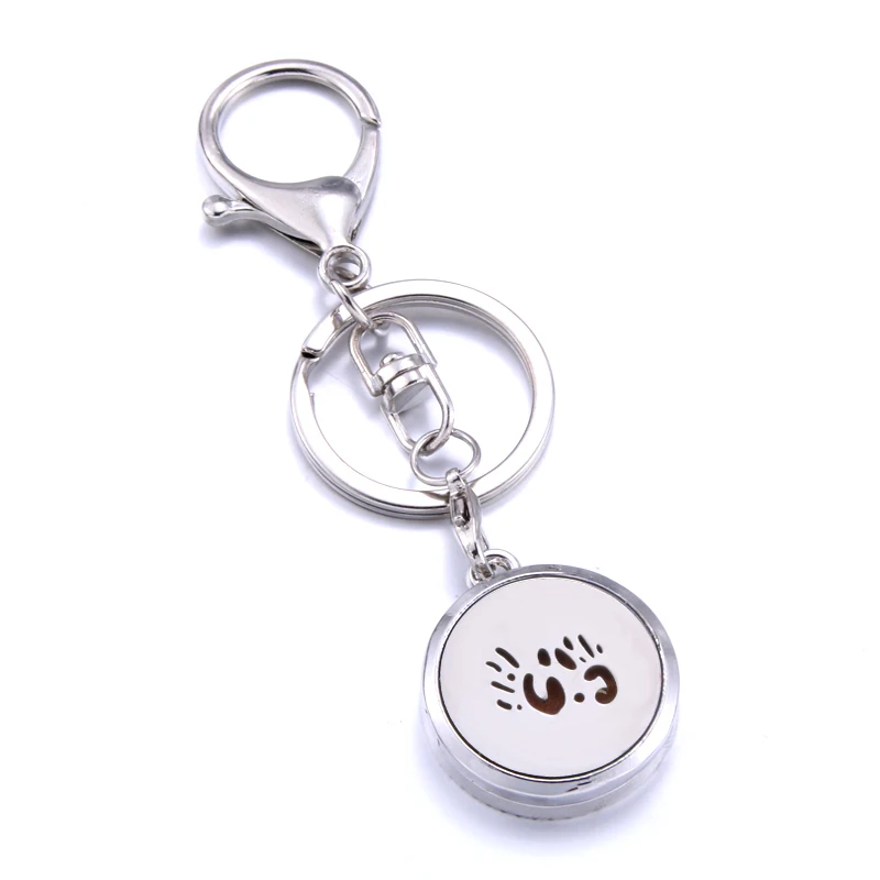 2019 charm Aromatherapy Jewelry palm pattern Stainless Steel Essential Oil Diffuser Perfume Locket Keychain Key Rings
2019 charm Aromatherapy Jewelry palm pattern Stainless Steel Essential Oil Diffuser Perfume Locket Keychain Key Rings