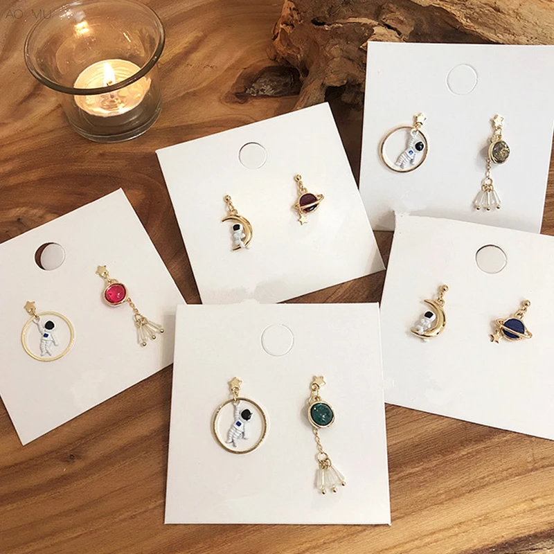 AOMU S925 Sterling Silver Pin Asymmetry Cute Universe Planet Star Astronaut Hollow Circle Crystal Tassel Drop Earrings For Women
AOMU S925 Sterling Silver Pin Asymmetry Cute Universe Planet Star Astronaut Hollow Circle Crystal Tassel Drop Earrings For Women