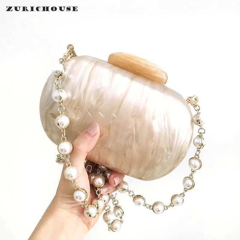 ZURICHOUSE 2019 Acrylic Clutch Bags Woman Luxury Pearls Chain Design Party Day Clutches Handbags Shoulder Messenger Bag Female
ZURICHOUSE 2019 Acrylic Clutch Bags Woman Luxury Pearls Chain Design Party Day Clutches Handbags Shoulder Messenger Bag Female