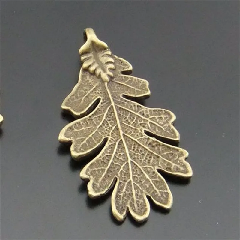 10pcs/pack Antique bronze alloy daisy leaf Necklace pandent Vintage Jewelry Findings Handmade Crafts Bracelet Dec 01329 44*27mm
10pcs/pack Antique bronze alloy daisy leaf Necklace pandent Vintage Jewelry Findings Handmade Crafts Bracelet Dec 01329 44*27mm