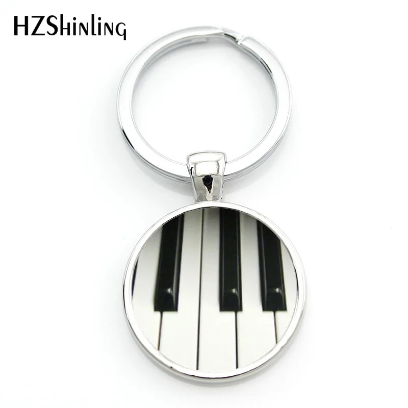 2018 Fashion Music Piano Style Keychain Classic Piano Keyboard Keyring Glass Cabochon Jewelry Handmade Silver Round Key chains
2018 Fashion Music Piano Style Keychain Classic Piano Keyboard Keyring Glass Cabochon Jewelry Handmade Silver Round Key chains